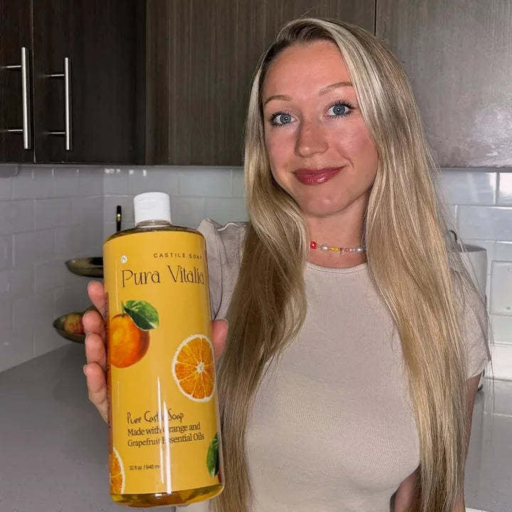 @ugcmom.lifestyle holding Pura Vitalia castile soap
